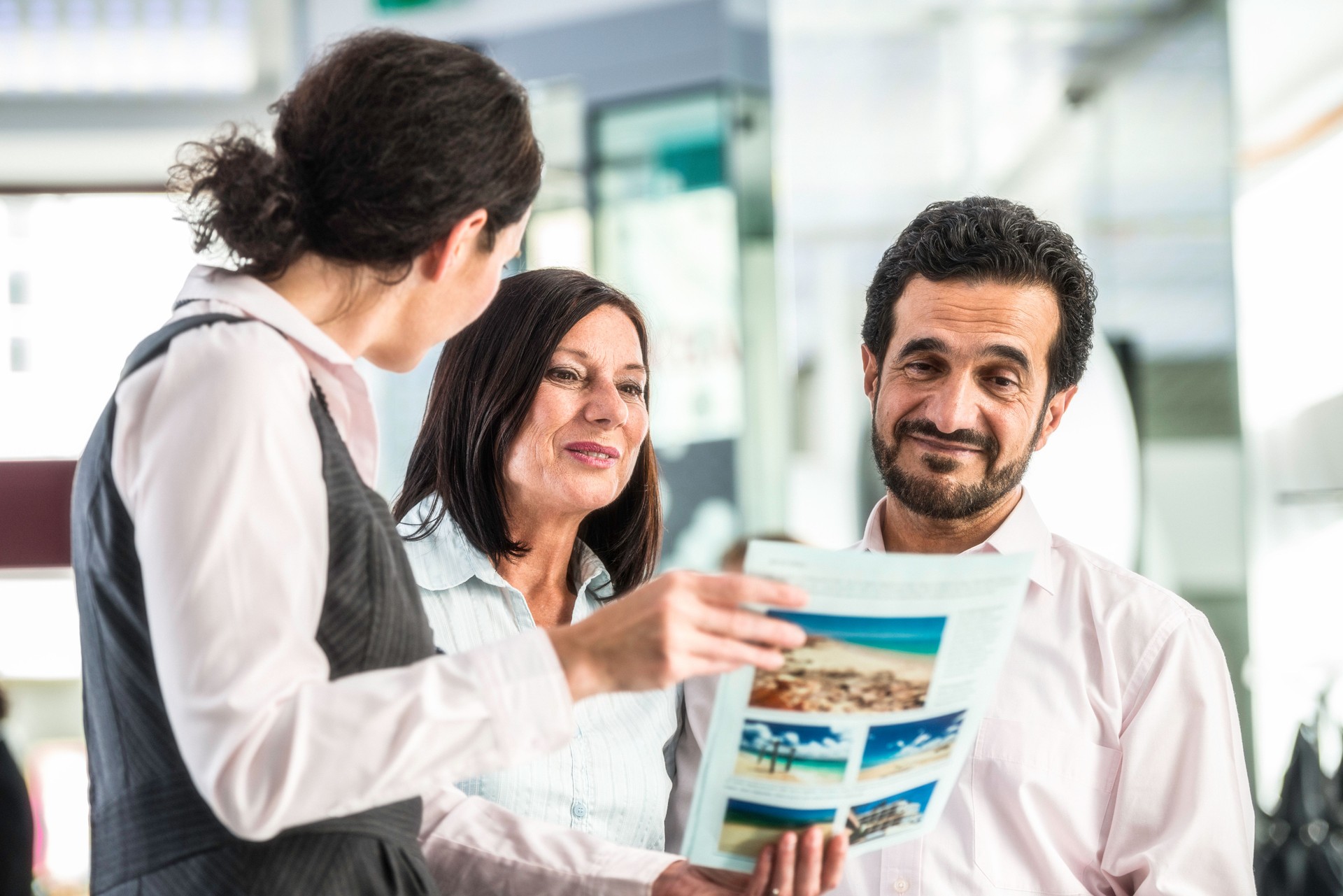 Female Travel Agent With Customers